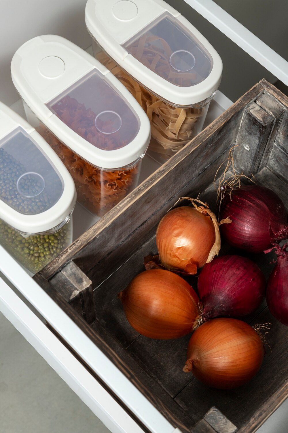 tidy-up-concept-with-onions-high-angle_23-2148927372